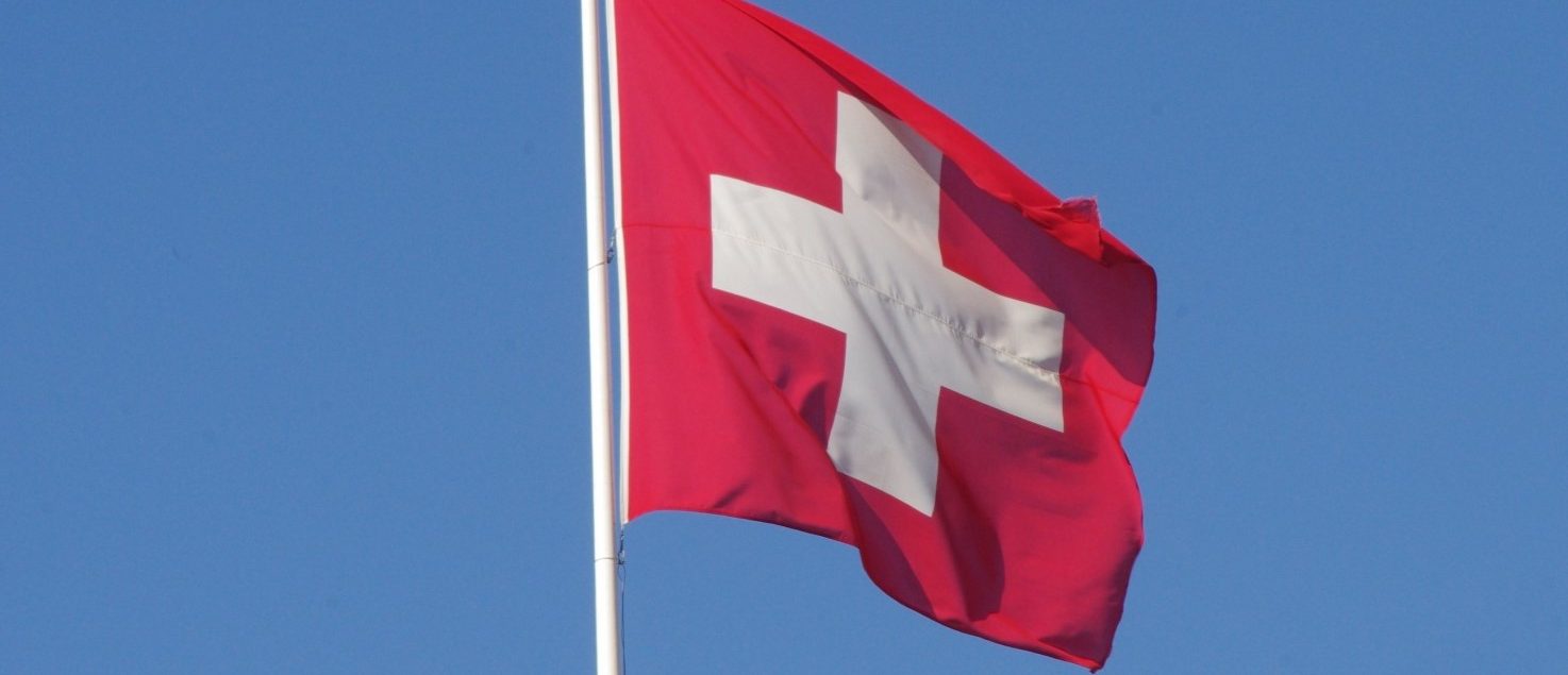 https://www.publicdomainpictures.net/en/view-image.php?image=420126&picture=switzerland-flag-against-blue-sky